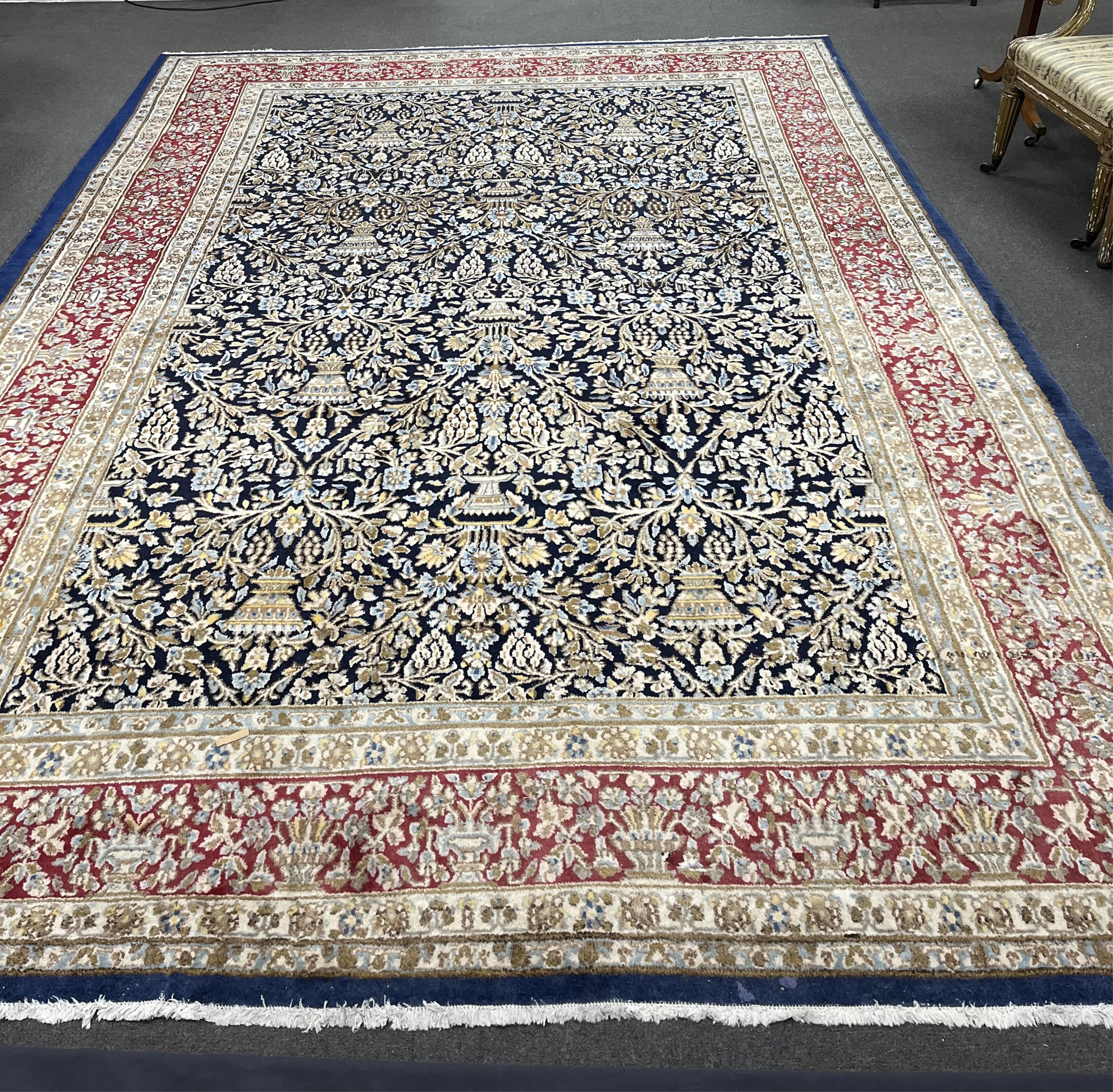 A North West Persian blue ground carpet, 394 x 284cm. Condition - good